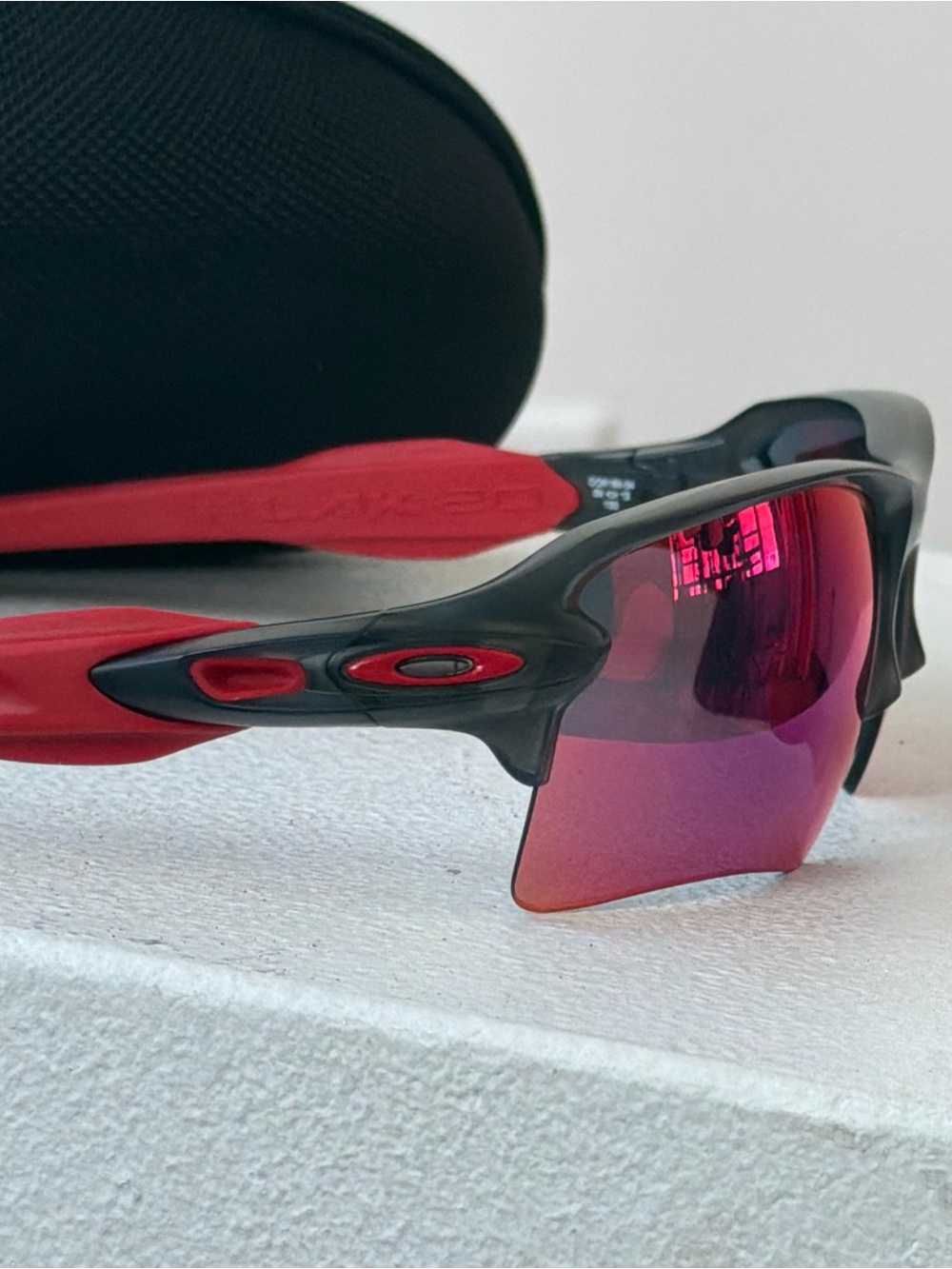 Oakley Black Frame with Red Accents and Red Mirror Lenses Sports Sunglasses